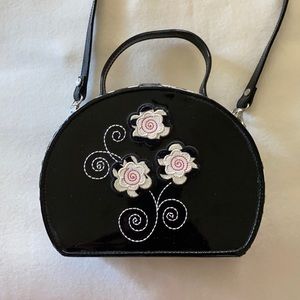 Black Patent leather w/ Animal Print Handbag with Matching skirt.